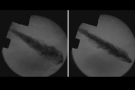 Die Schwarz-weiß-Aufnahme zeigt zwei Bilder nebeneinander, die eine unterschiedlich stark ausgebreiteten Fleck in einem runden Kammer zeigen.